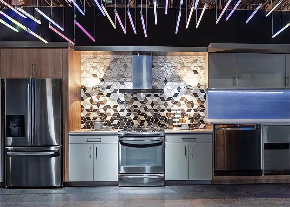 Glossy glass mosaic kitchen backsplash installation in Clermont, FL by Aesthetic Tile