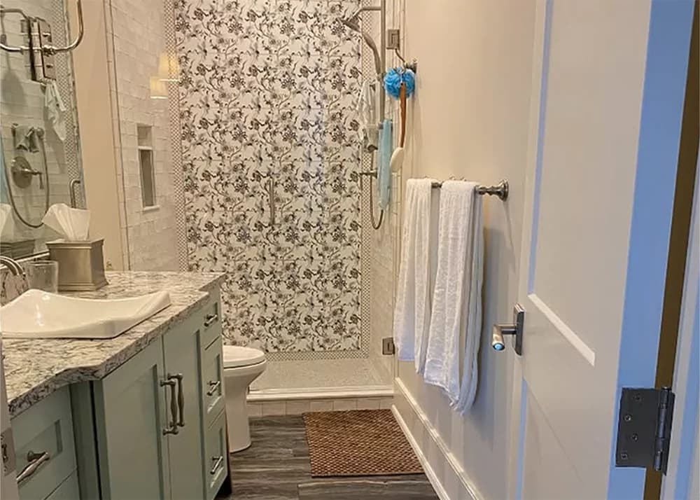 Decorative shower tile installation by Aesthetic Tile