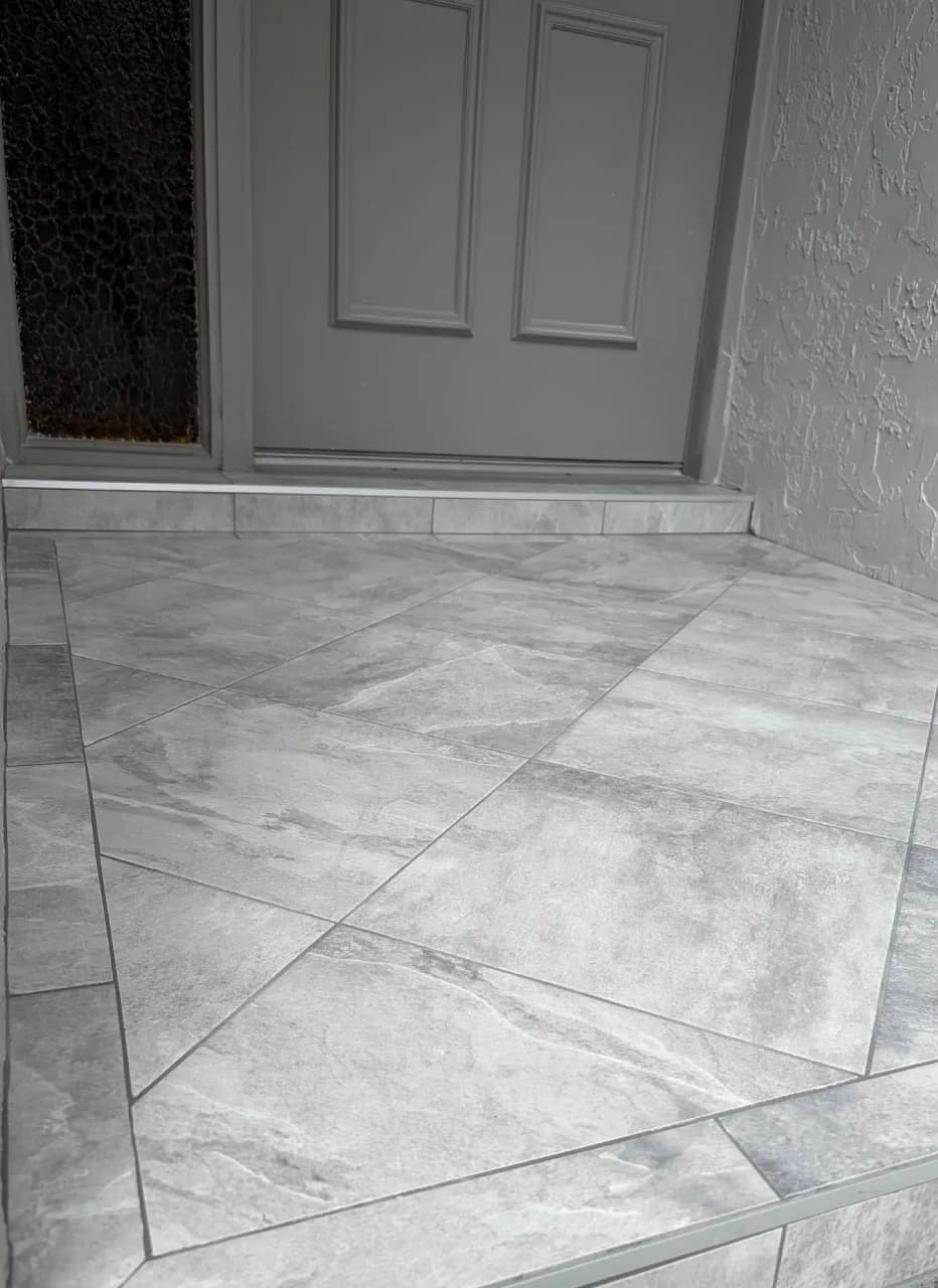 Close view of the diagonal porcelain layout and framed border