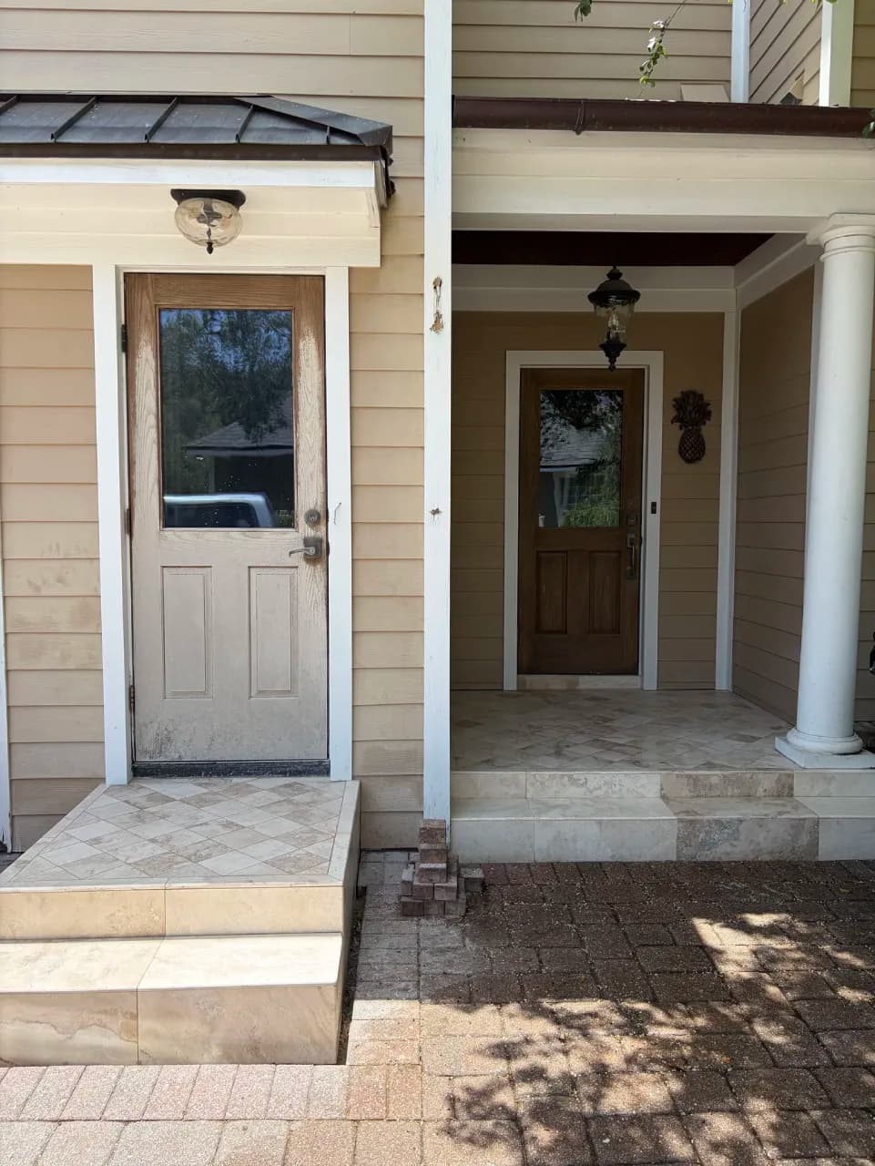 Completed side porch with recut marble flooring and stone steps