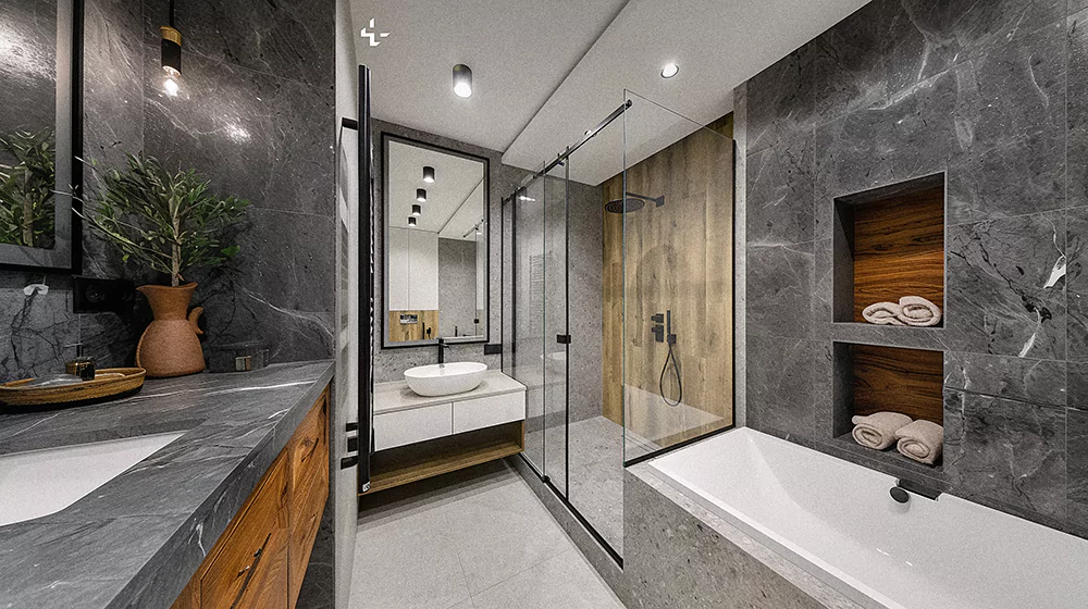 Luxurious spa-like bathroom with gray marble tiles and modern fixtures